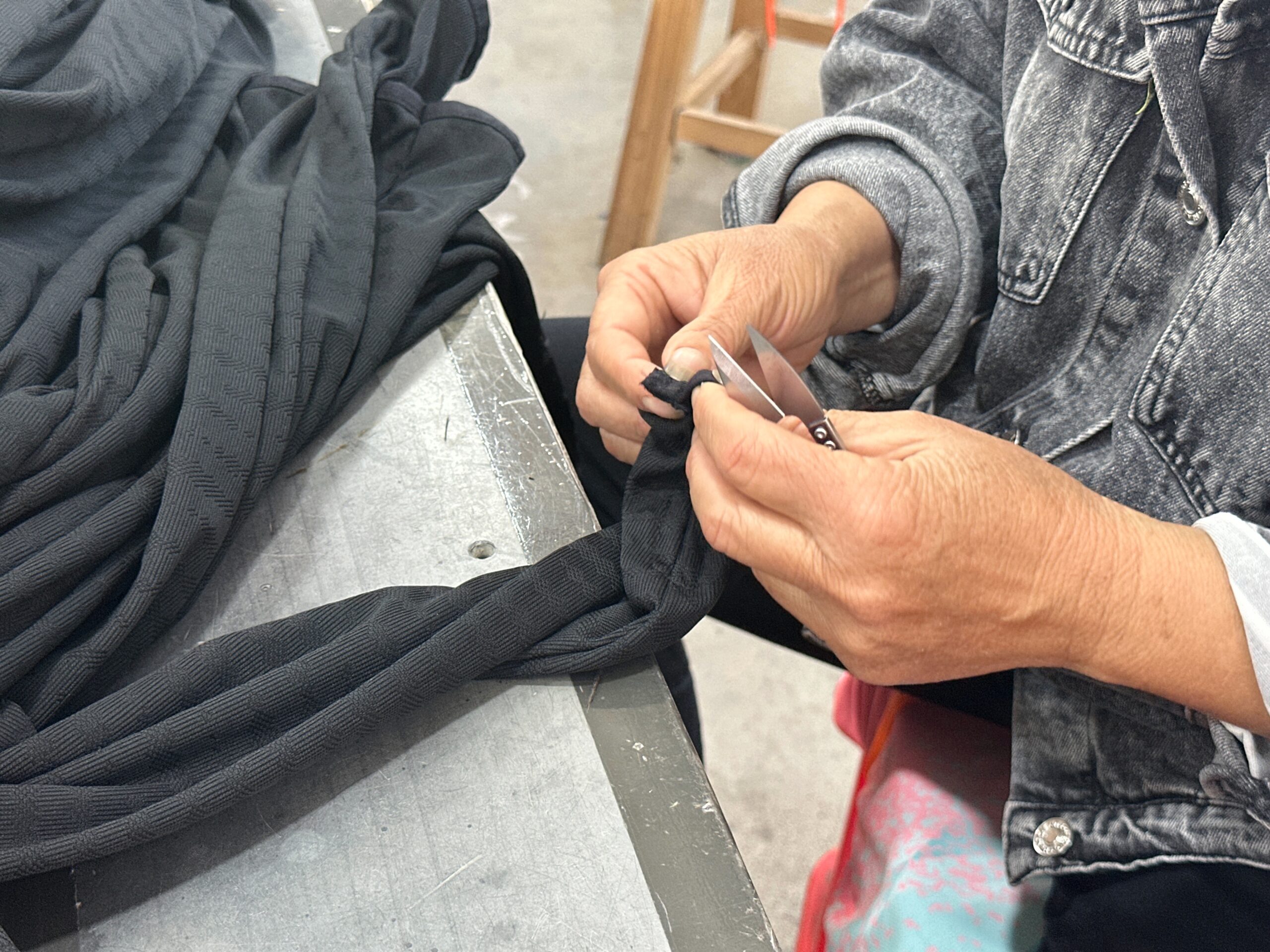 Why Loose Threads Sometimes Appear on Sports Jerseys — And How They Are Removed Before Shipment